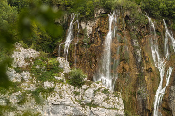 Beautiful waterfalls among green mountains