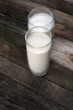milk on wooden background