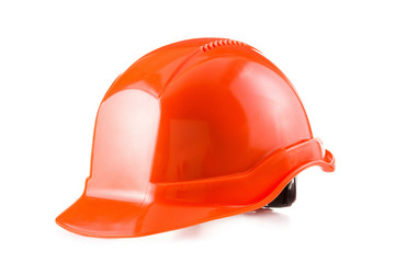 Fototapeta premium Red safety helmet on white background, hard hat