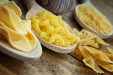 Obraz na płótnie Canvas Close up of pasta on spoons