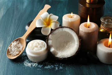 Obraz na płótnie Canvas Spa coconut products on dark wooden background