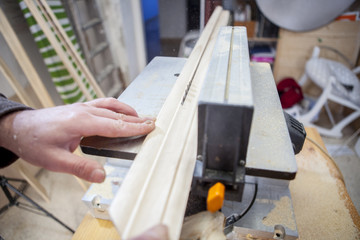 Carpenter using electric circular saw