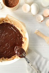 Uncooked chocolate pie on a table