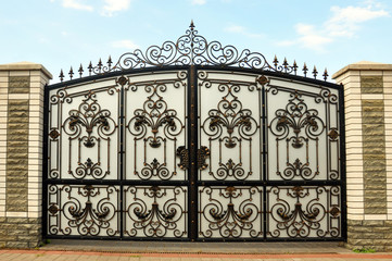 iron gate with wrought ornament on it