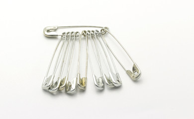 Safety pin isolated on white background