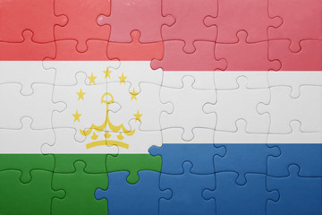 puzzle with the national flag of netherlands and tajikistan