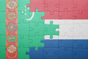 puzzle with the national flag of netherlands and turkmenistan