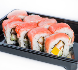 close-up of sushi roll in the black box, Sushi delivery. shallow