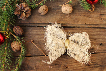 Border frame of fir tree, walnut and ribbon - copy space