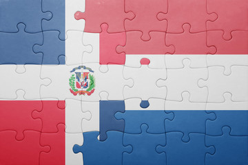 puzzle with the national flag of netherlands and dominican republic