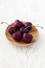  cherry on wood background