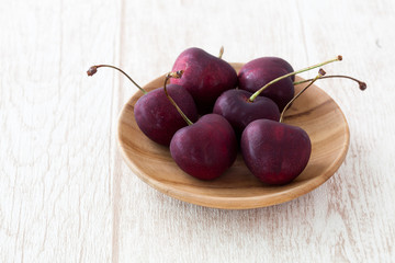 cherry on wood background
