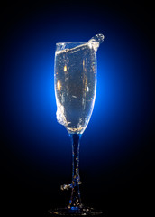 Glass of champagne with splashes
