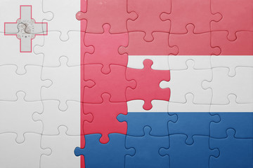 puzzle with the national flag of netherlands and malta