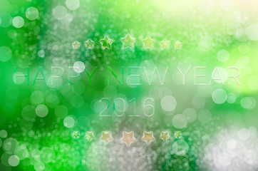 Happy New Year 2016 on the bokeh background and star