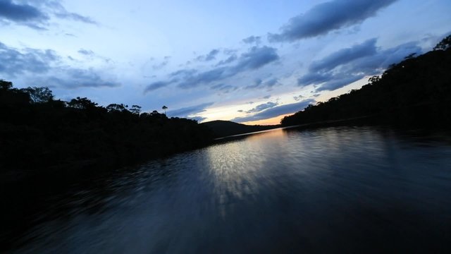 Sunset in the Canaima National Park and reflections in the water of the Gauja river. Bolivar State, Venezuela 2015