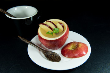 Jelly add in apple decorate with a slice of apple.