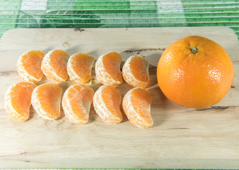 Orange on wooden block