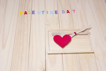 With Heart concept valentine on Wood dish and wood background.