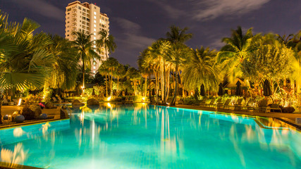night view of beautiful swimming pool in tropical resort , Phuket, Thailand