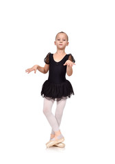 girl dances ballet in her ballerina tutu