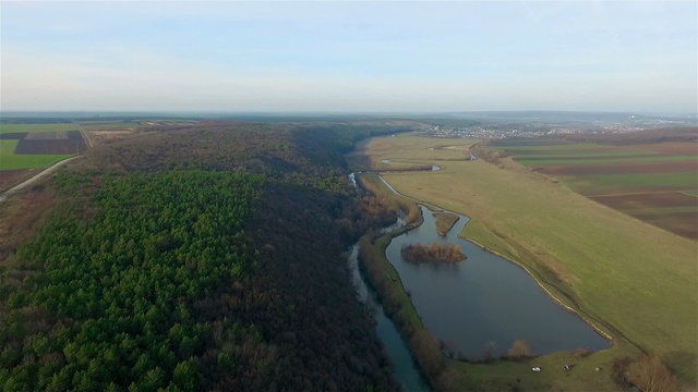 Aerial view over the forest and lake