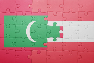 puzzle with the national flag of maldives and austria