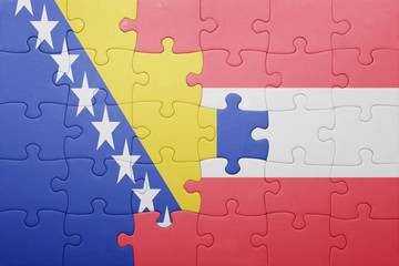 puzzle with the national flag of bosnia and herzegovina and austria