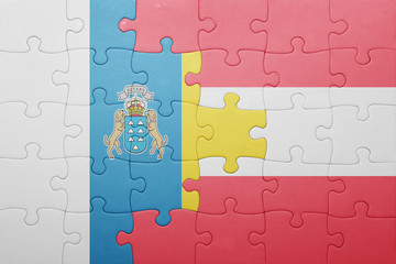 puzzle with the national flag of canary islands and austria