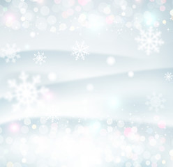 vector Christmas background with snowflakes blurred in the backg