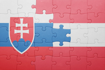 puzzle with the national flag of slovakia and austria
