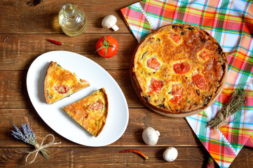 Quiche is a savoury, open-faced pastry crust with a filling of s