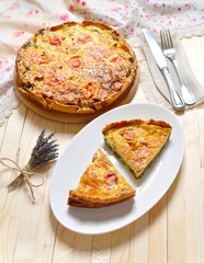 Quiche is a savoury, open-faced pastry crust with a filling of s