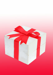 Red bow gift on red background.