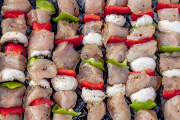 Raw chicken on the grill