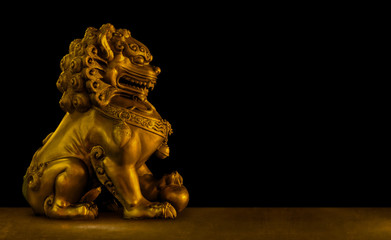 Fototapeta premium Chinese Lion isolated on black background include vector path