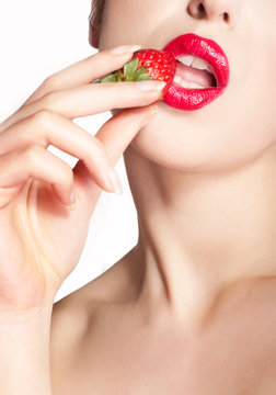 Red lips close up and strawberry
