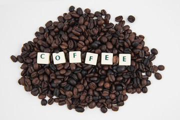 COFFEE white cube text on white background AND coffee beans background 