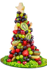 christmas tree made from fruit Berry on white back ground