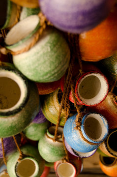 Mexican ceramic pots on ropes