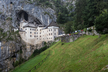 Fototapeta na wymiar Renaissance Castle Built Inside Rocky Mountain in Predjama, Slov