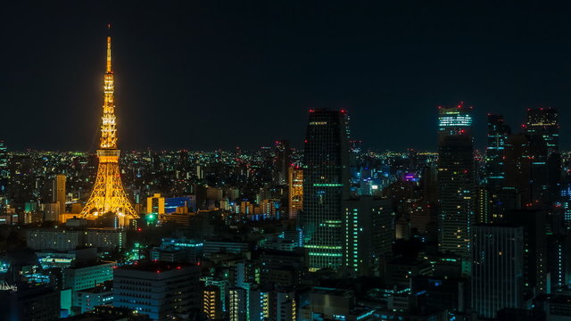 Timelapse video showing the transition from night to day in Tokyo (Japan), featuring the Tokyo Tower and Mt. Fuji