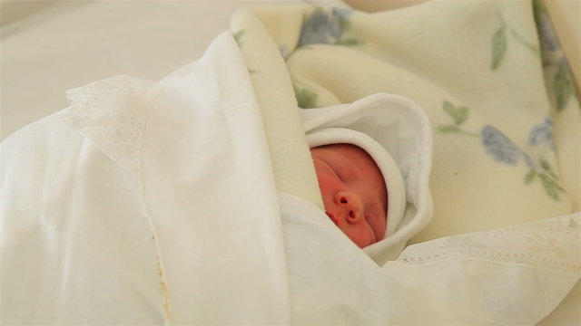 Beautiful little girl just born sleeping
