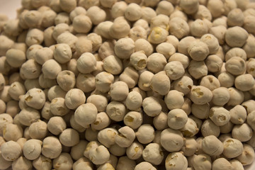 This is a closeup photograph of white roasted chickpeas