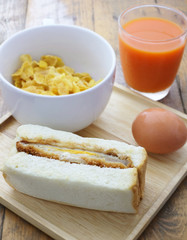 breakfast meal, bread, cereal, egg, orange juice