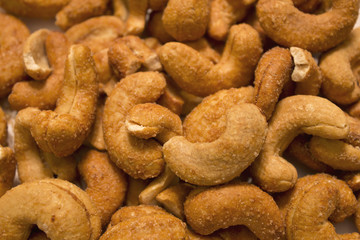 This is a closeup photograph of smoked cashews