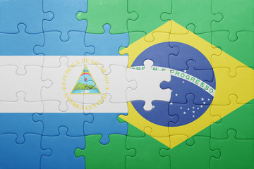 puzzle with the national flag of nicaragua and brazil