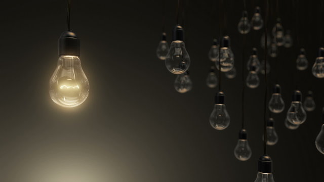 Idea concept with light bulbs on background