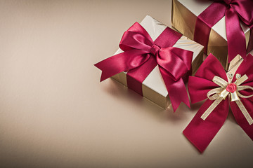 Present boxes with tied ribbons red bow holidays concept