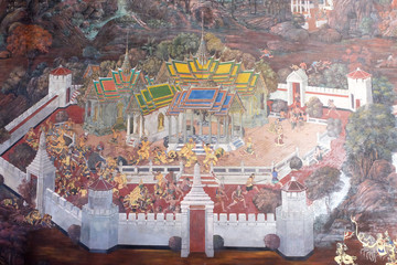 the Ramayana painting on the wall in public temple Wat Phra Kaew in Thailand